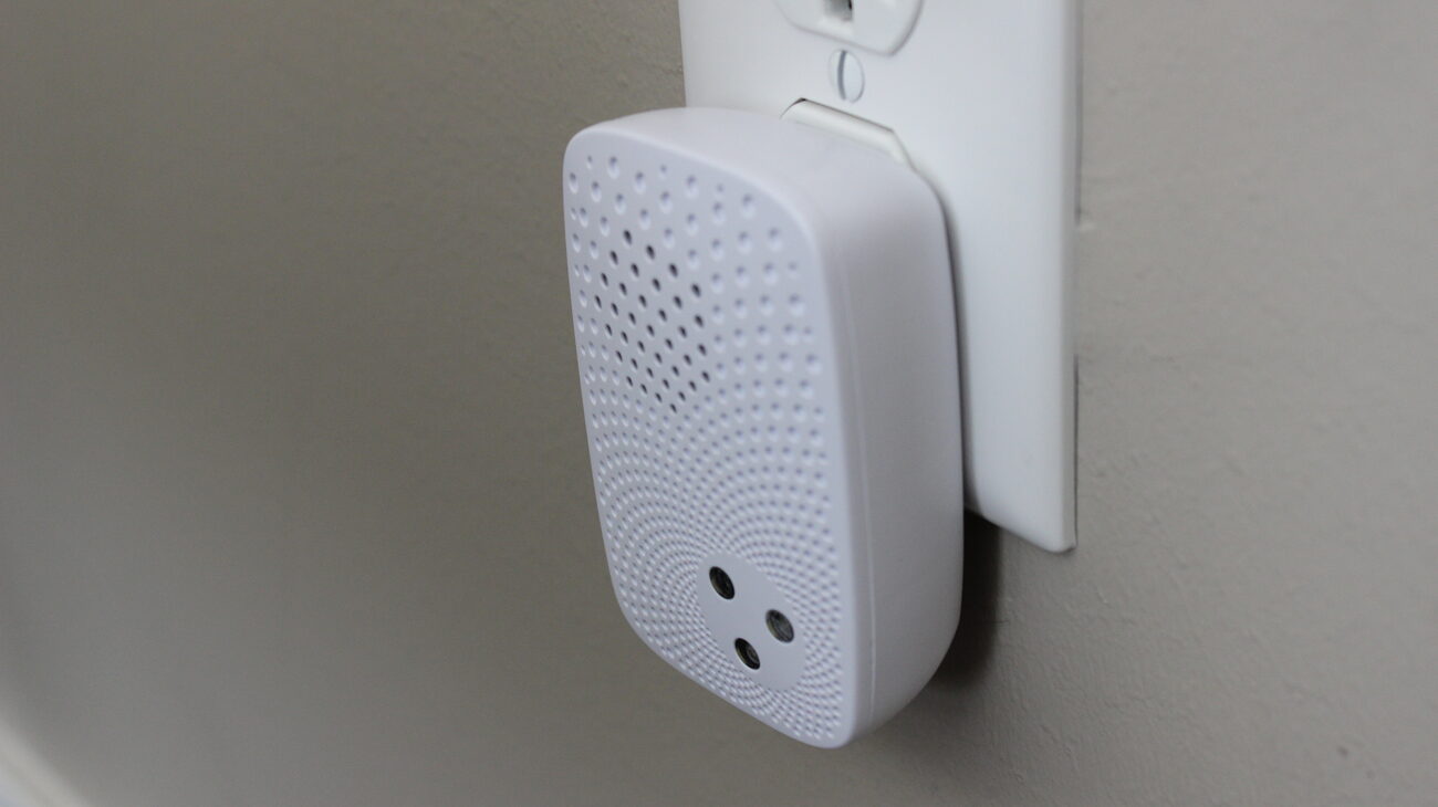Wireless alarm siren installed in a property